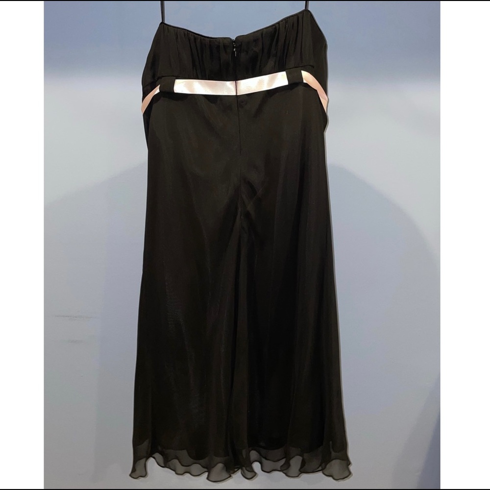 Black dress with pink ribbon